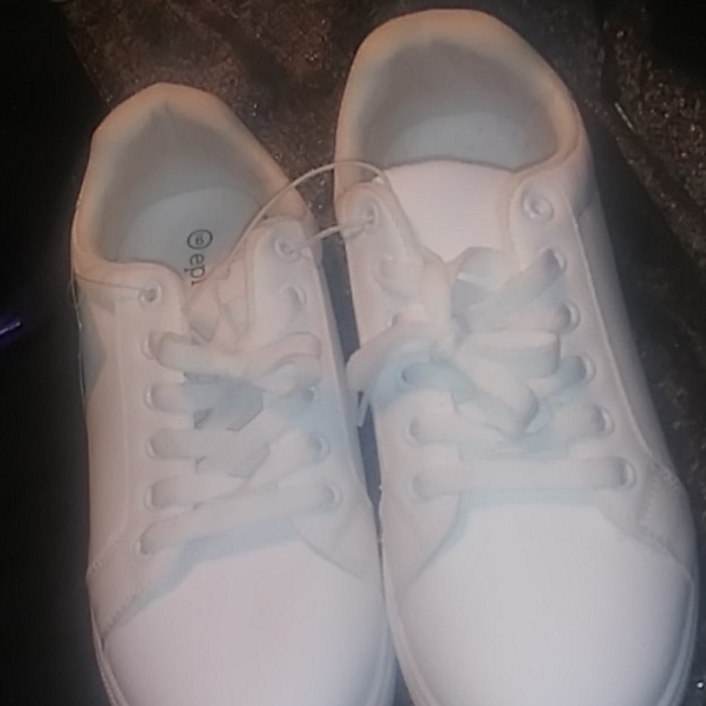 White shoes with silver on it